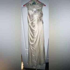 Ivory long dress with sequence embellishment and open back